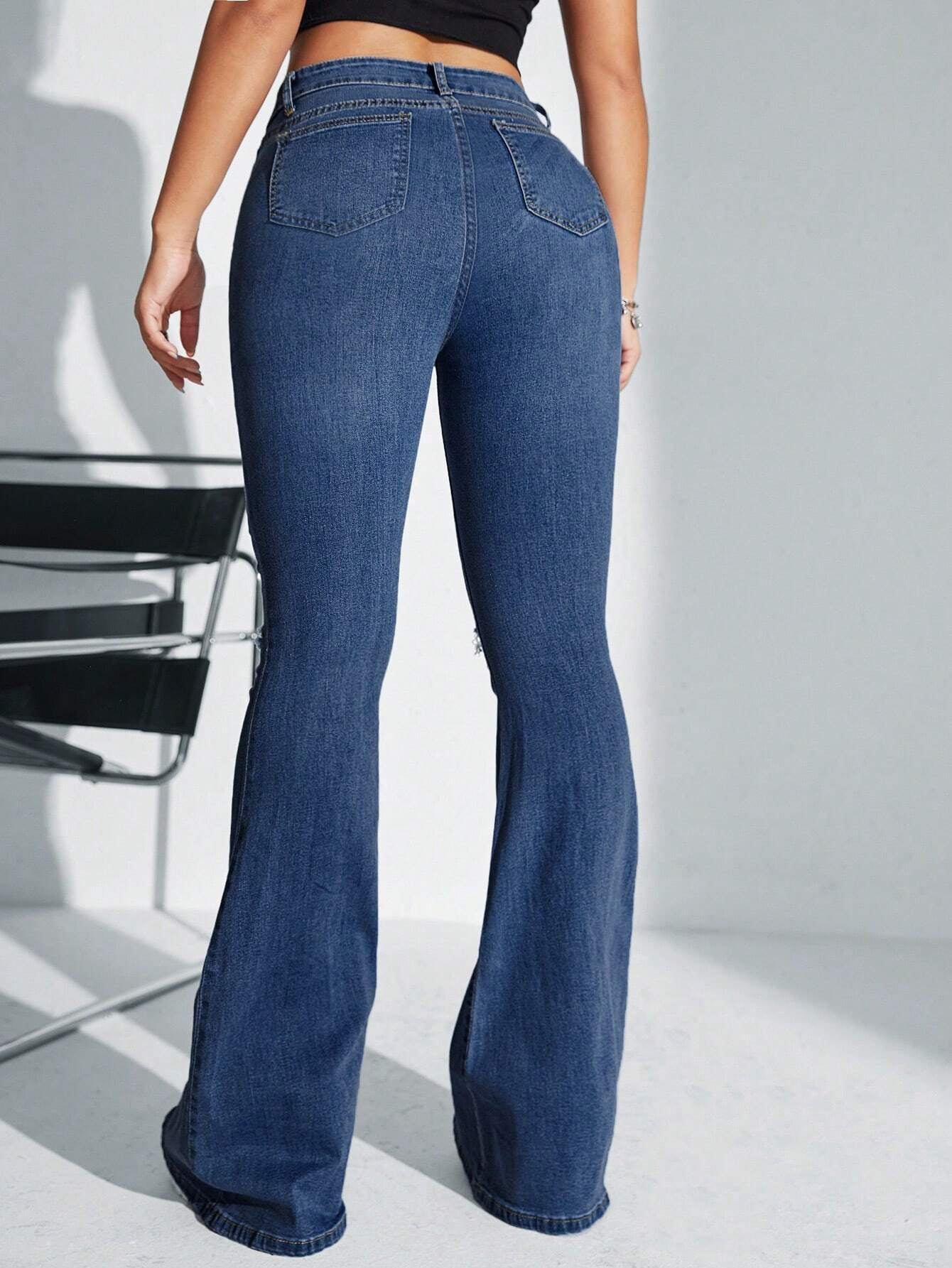 SHEIN SXY High-Waisted Ripped Flare Leg Jeans