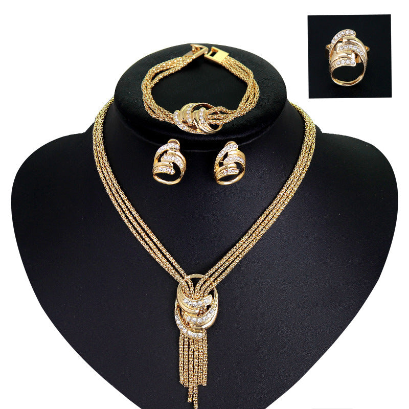 Elegant Europe and America Four-Piece Bridal Jewelry Set - Necklace, Bracelet, Earrings, and Ring