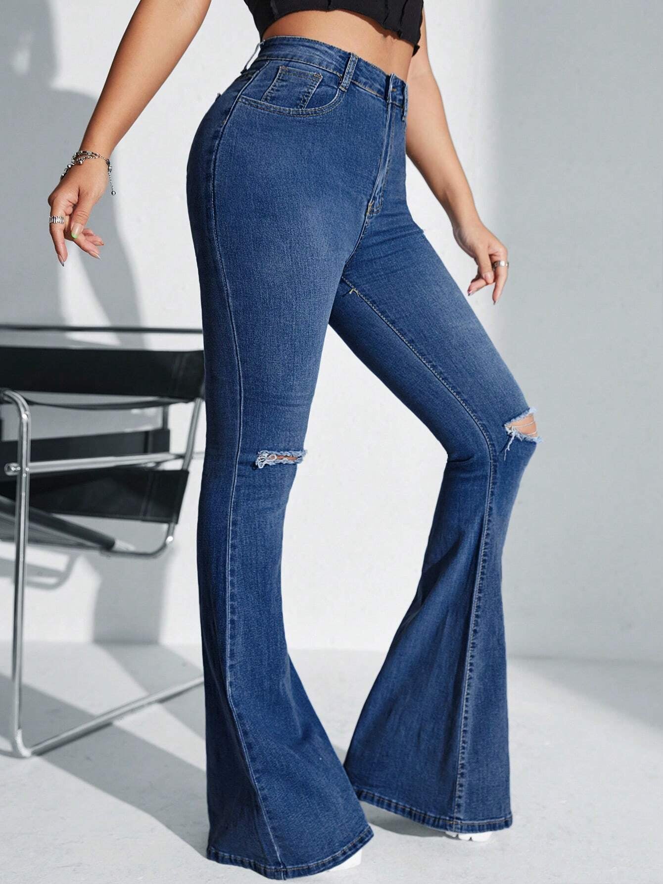 SHEIN SXY High-Waisted Ripped Flare Leg Jeans